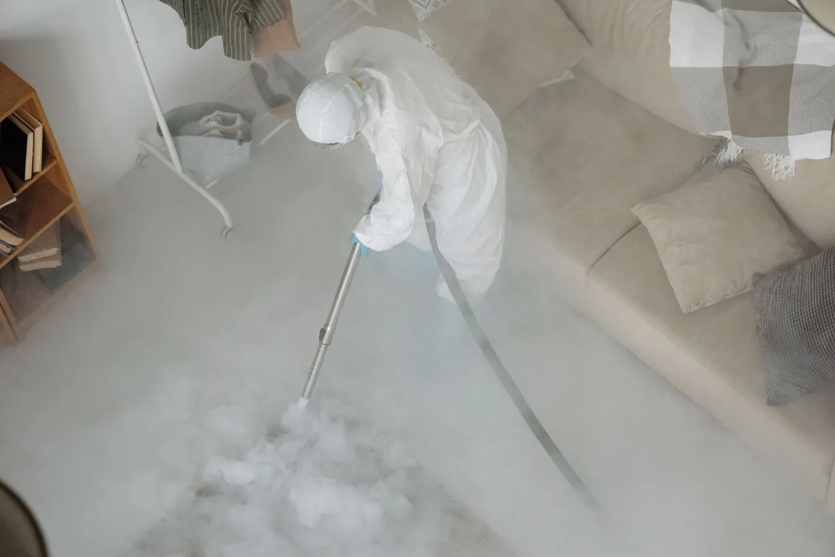Biohazard cleanup technician in protective equipment, Virginia Gardens, FL